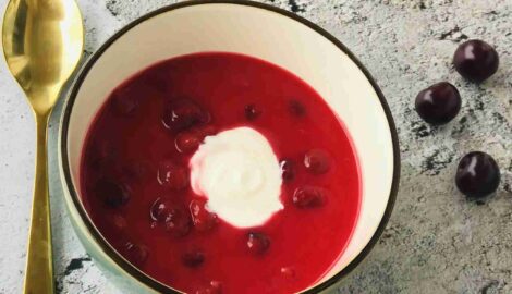 Fresh cold Sour Cherry Soup with whipped cream