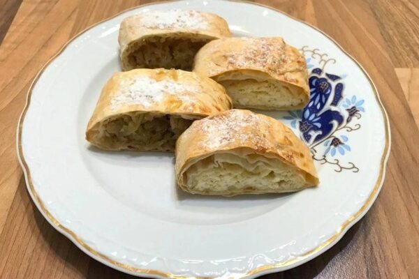 Tasty Strudel with apple and cottage cheese fillings made with filo dough