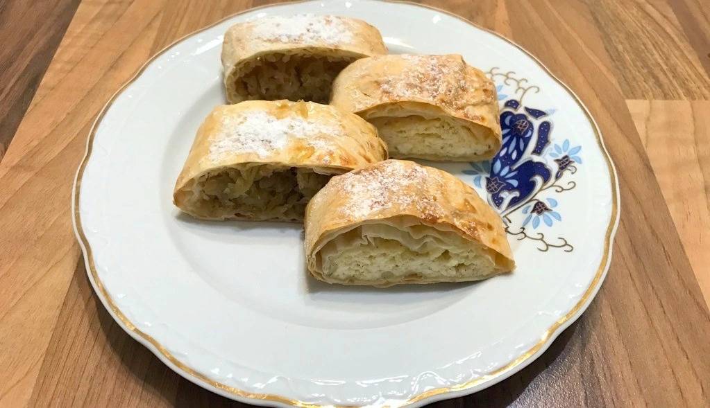 Tasty Strudel with apple and cottage cheese fillings made with filo dough