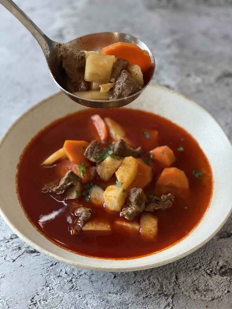 Serving the famous and tasty Goulash soup