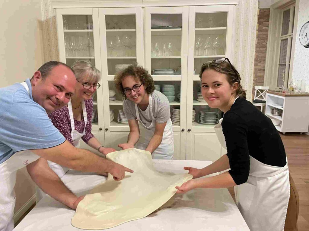 Streching the dough with nice American tourists from California
