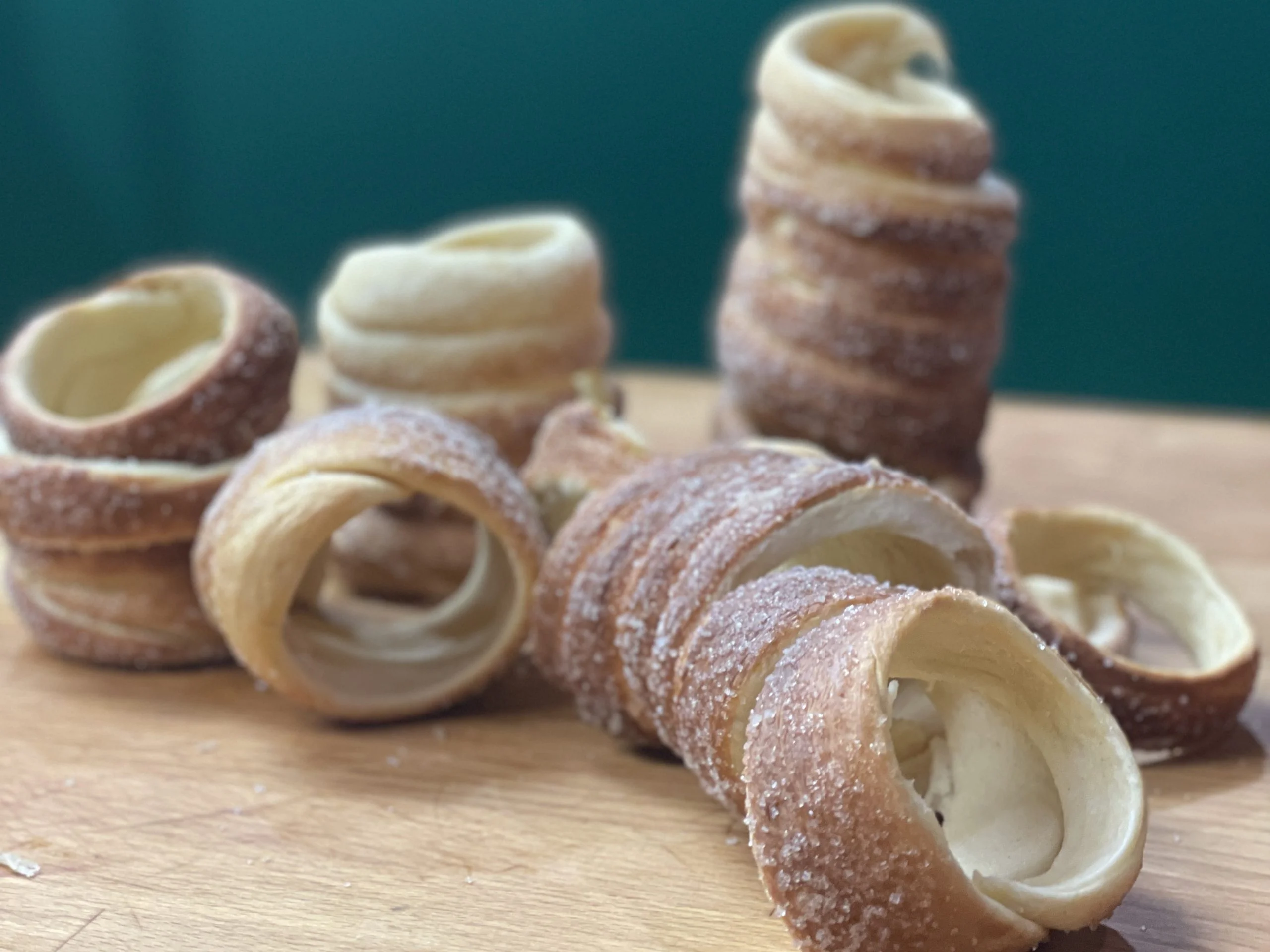 Freshly baked Hungarian Chimney Cake (Kürtőskalács) ready to eat at Flavors of Budapest Opera cooking class